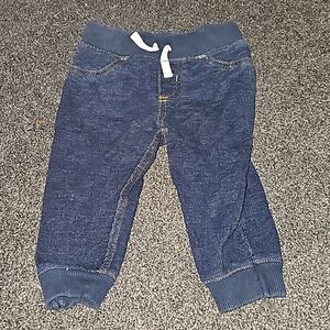 9 month drawstring dark washed jeans.